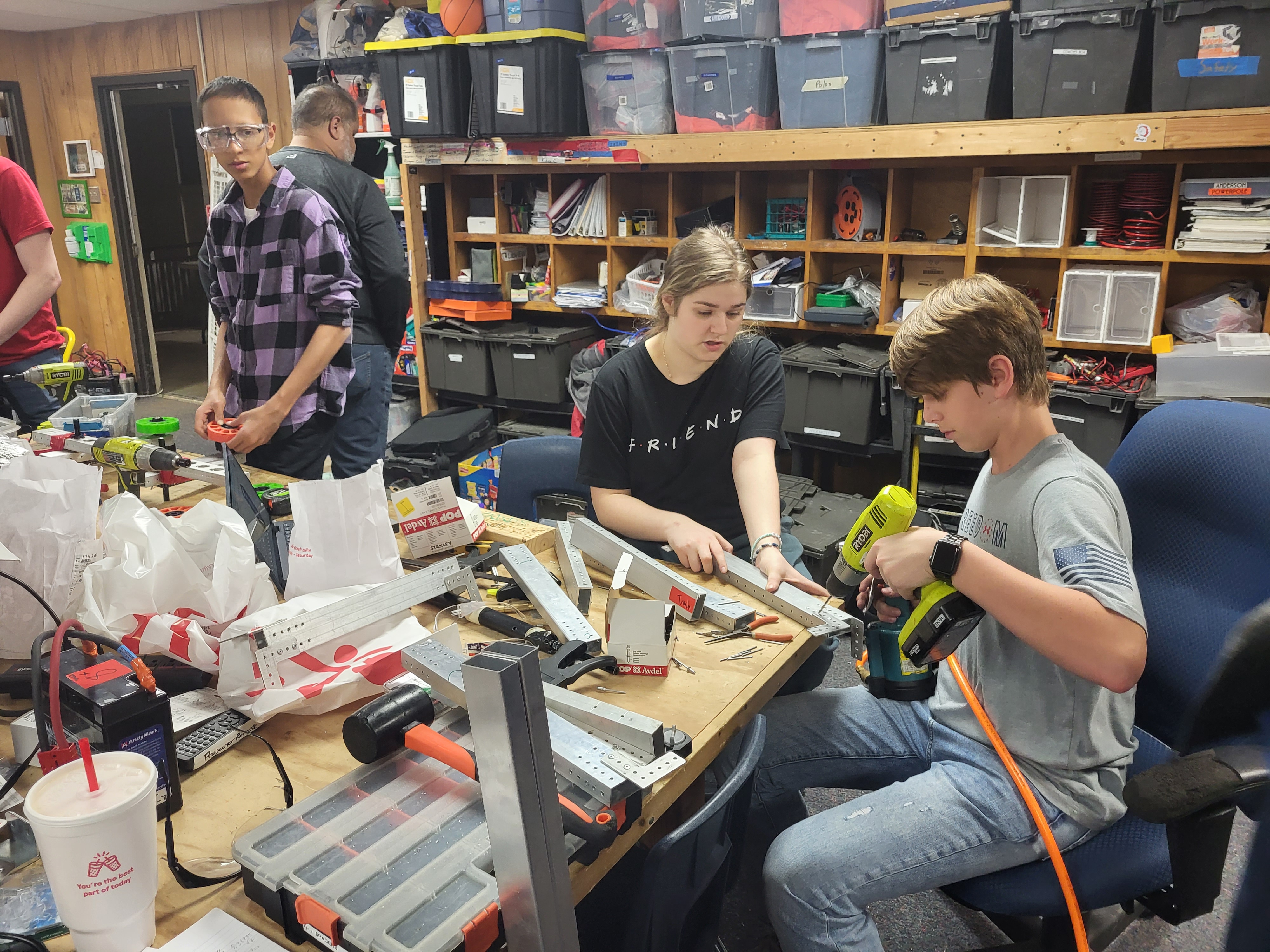 Team members working in the workshop